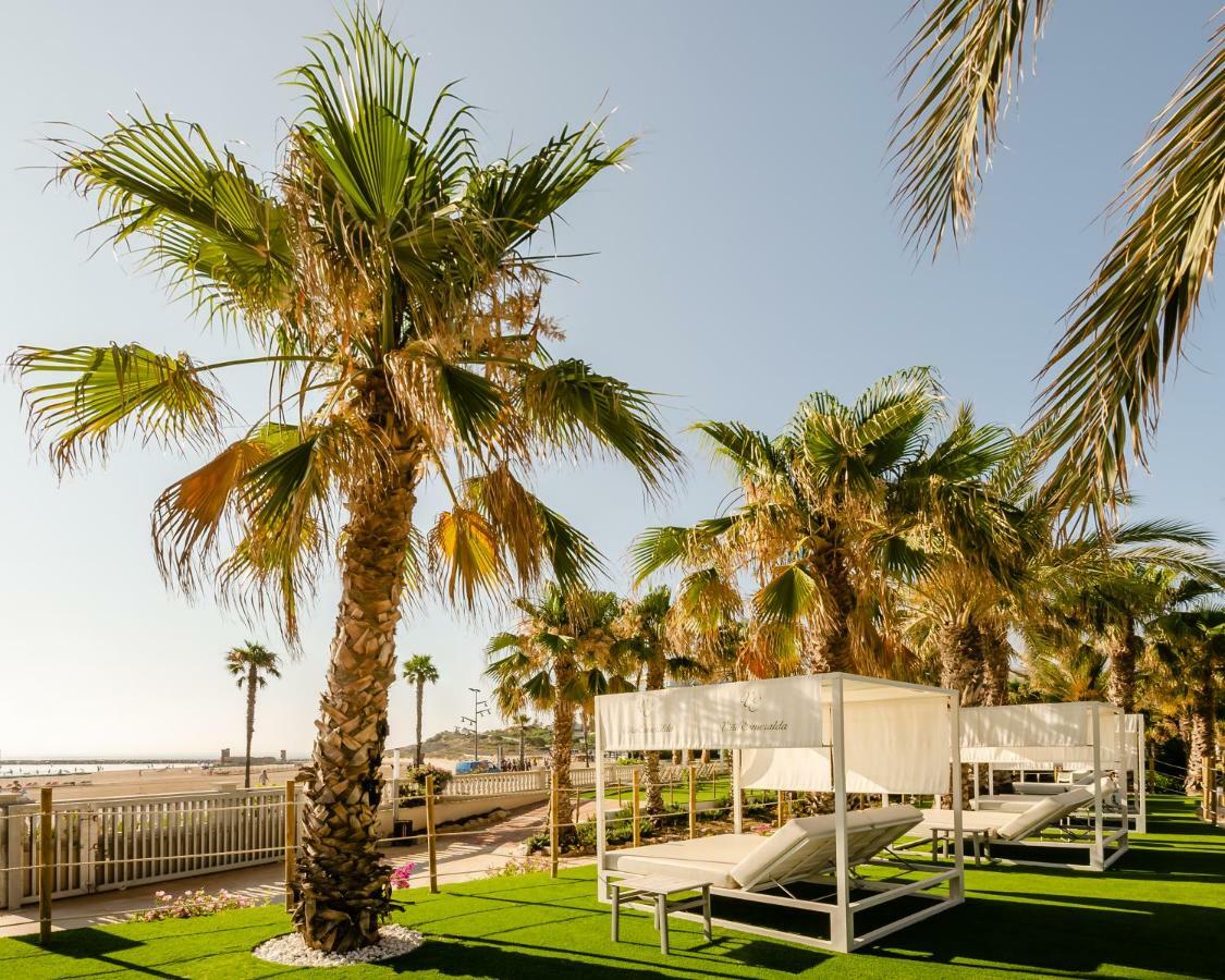 לה פינדה Gran Palas Hotel - Spa Incluido מראה חיצוני תמונה Palm trees in the resort